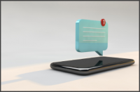 3D Chat Icon on top of a phone