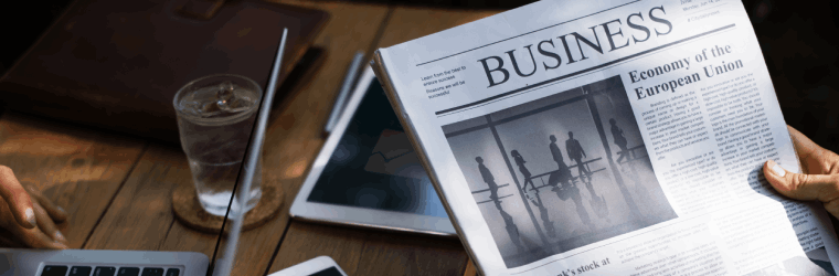 Kathimerini Gets Ready for Remote Work Person reading a newspaper