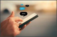 Woman hand using smart phone with chat icon