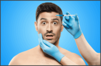 Man receiving filler injection from doctor