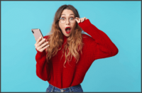 Surprised woman holding a phone and eyeglasses