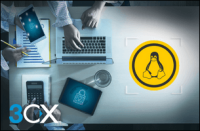 Desk with devices and linux logo